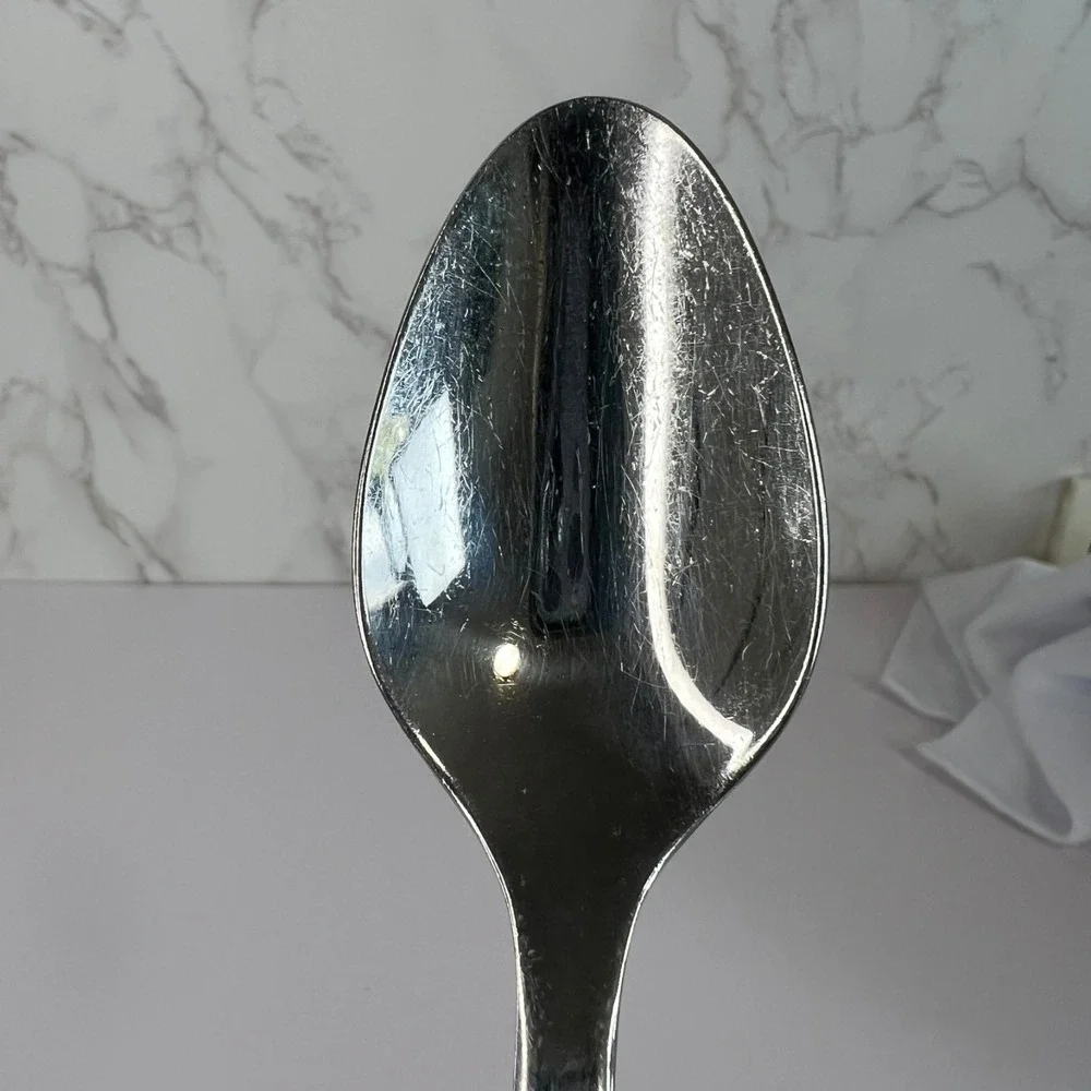 Oneida Apollo 18/10 Stainless Steel Pierced Circles Glossy Dinner Spoon Flatware
